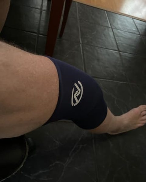 A customer wearing the Cocoon knee sleeve
